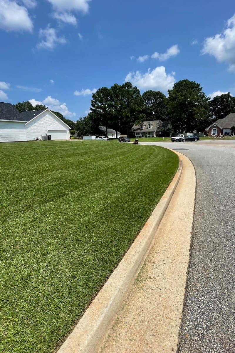 Freshly striped, professionally maintained lawn — Arrowhead Outdoors Co.